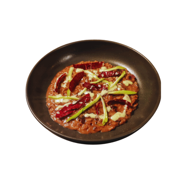 Risotto mit Lagrein, Radicchio, Puntarelle und Frischkäseschaum