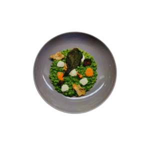 Orzotto with black cabbage cream, vegetable chips and bell pepper foam