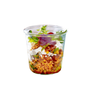 Beluga lentil salad with homemade kimchi, rocket and cream cheese praline