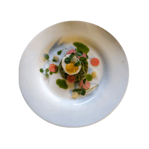 Asparagus and barley salad, wild garlic, poached egg, fermented radishes, and country ham