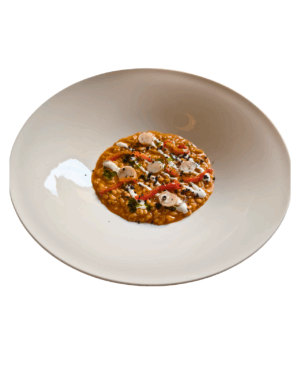 Risotto with pepperoni, goat's cheese foam, lampaschioni and thyme oil
