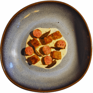 "Polenta & salsiccia su fonduta di taleggio e salvia al forno